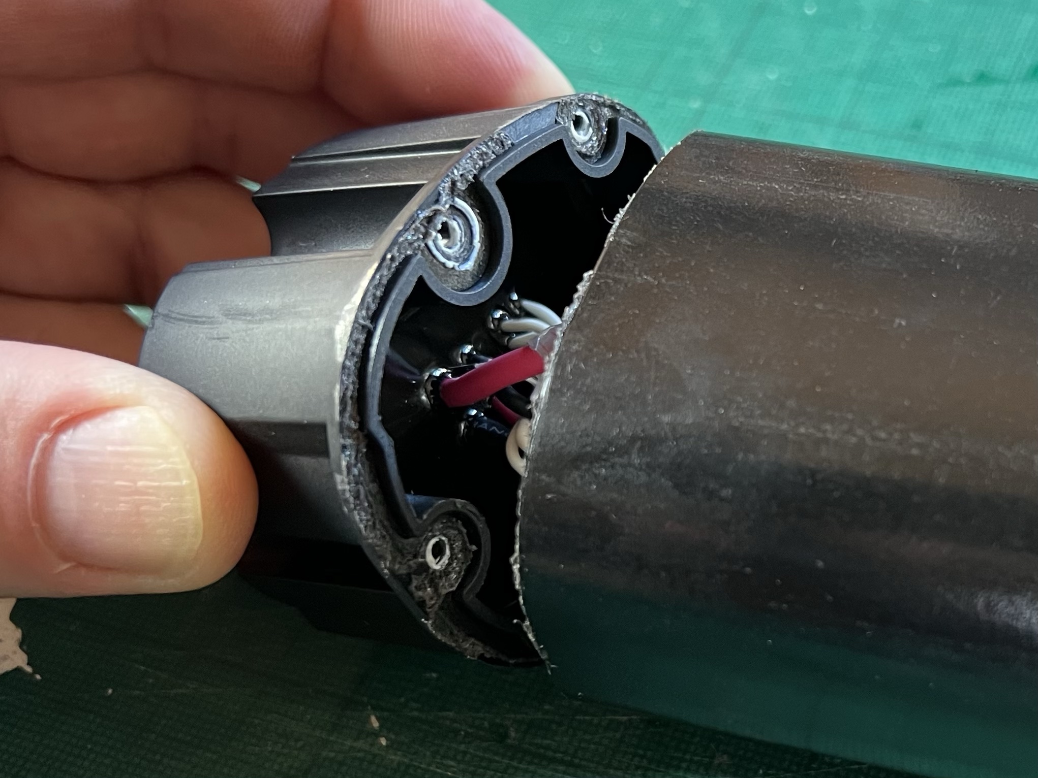 Power connections within casing tube.